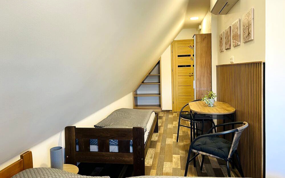 Podkrovní třílůžkové pokoje